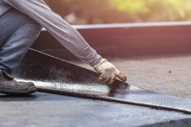 Professional Basement Waterproofing technician working in Lake George, MI